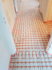 Droogbouw vloerverwarming op houten vloer